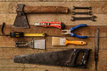 Different industrial tools over wooden surfaceの写真素材