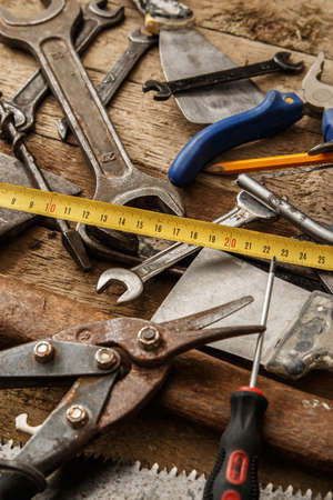 Different industrial tools over wooden surfaceの写真素材