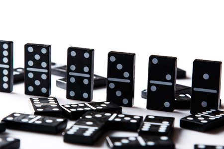 Pieces of  black domino tilesの写真素材