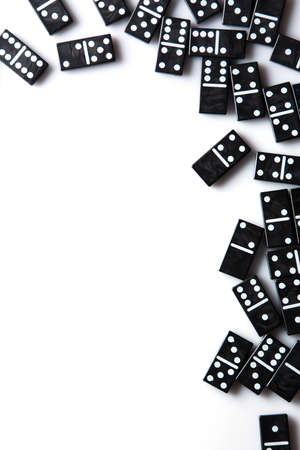 Pieces of  black domino tilesの写真素材