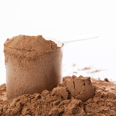 Close up of protein powder and scoopの写真素材