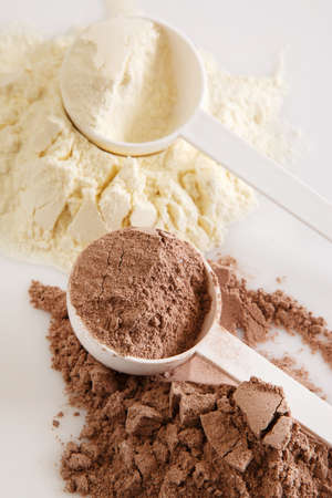 Close up of protein powder and scoopsの写真素材