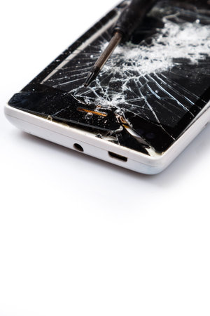 Broken smartphone with cracked display
