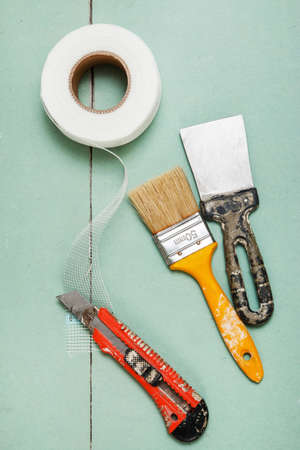 Reinforcing net and instruments over plasterboard surfaceの写真素材