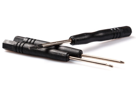Small screwdrivers on white background