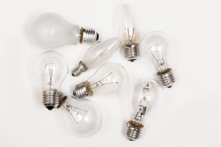 Different lightbulbs on grey background