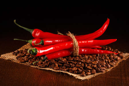 Red chili peppers and coffee beansの写真素材