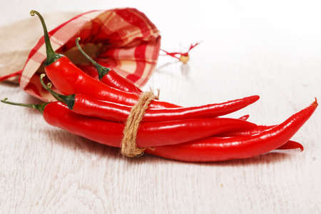 Red and hot chili peppers in sackの写真素材