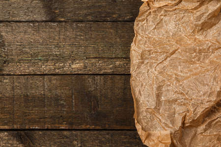 Old and crumpled sheet of paperの写真素材