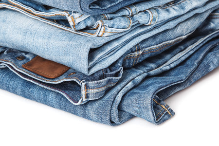Stack of different blue jeansの写真素材