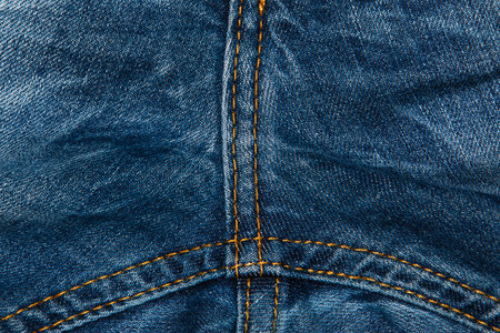 Background of blue jeans textureの写真素材