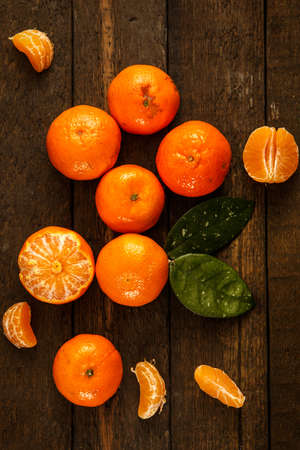 Fresh and sweet manadrins on wooden tableの写真素材