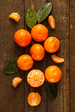 Fresh and sweet manadrins on wooden tableの写真素材