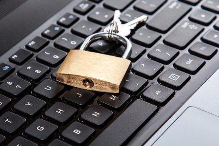 Padlock on a laptop keyboard. Concept of internet security