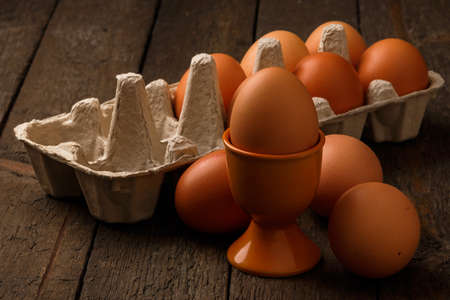 Brown eggs on the tableの写真素材