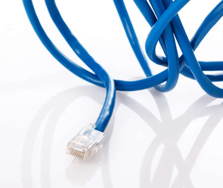 Blue internet cable on white backgroundの写真素材