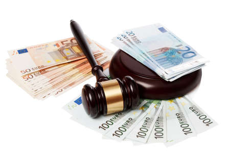 Gavel and banknotes on white backgroundの写真素材