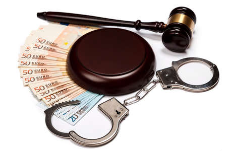 Gavel and banknotes on white backgroundの写真素材