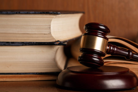 Judge gavel and old books
