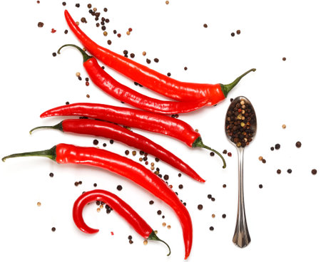 Red chili and dried pepper seeds on white backgroundの写真素材