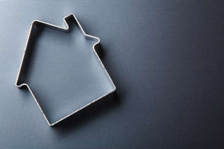 Small abstract metallic houseの写真素材