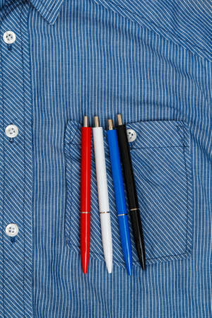 Shirt and colorful pensの写真素材