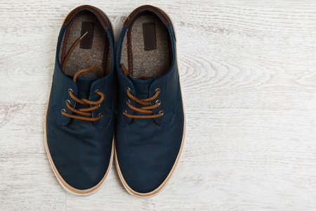 Stylish male shoes on the floorの写真素材