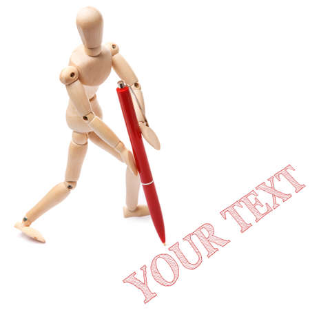 Small wooden dummy and ballpoint pen on white backgroundの写真素材