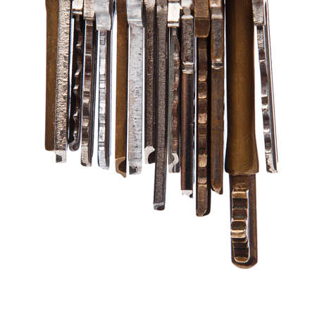 Keys on the thread  over white backgroundの写真素材