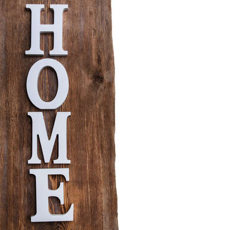 White letters with word HOME on wooden surfaceの写真素材