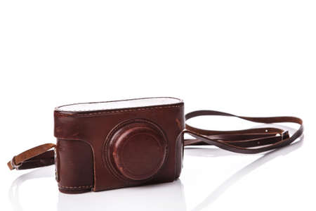 Retro camera in leather case on white backgroundの写真素材
