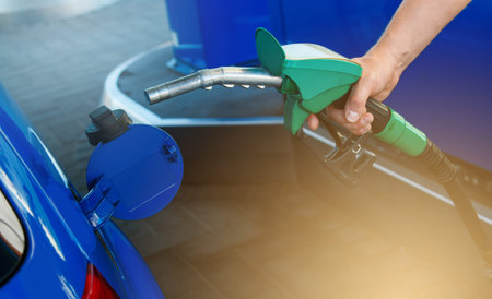 Man refuel his car on gas station
