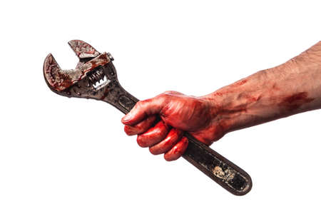 Male hand with bloody wrench on white backgroundの写真素材