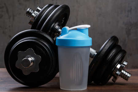 Dumbbells and shaker for protein cocktailの写真素材
