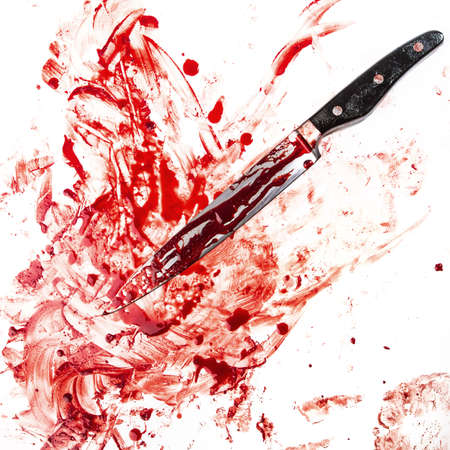 Knife in blood on white backgroundの写真素材