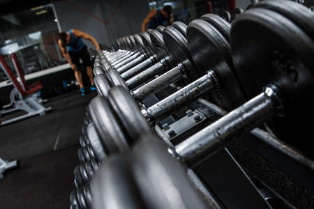 Various dumbbells in gymの写真素材