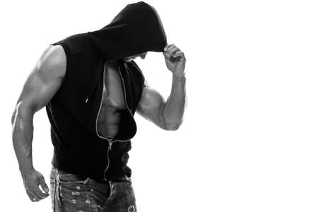 Handsome muscular man posing in studioの写真素材