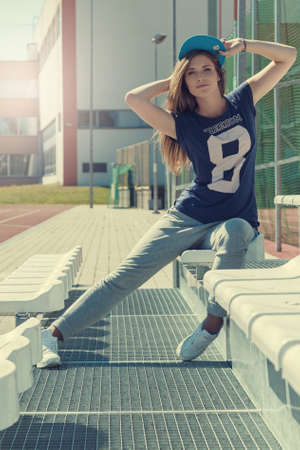 Beautiful teenage girl on the schoolyardの写真素材