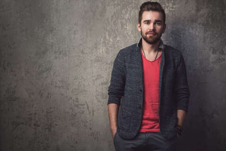 Portrait of handsome guy with beard and stylish haircutの写真素材