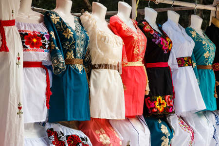Traditional Mexican dresses on the local marketの写真素材