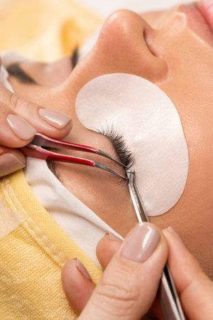Procedure of eyelashes extension in salon