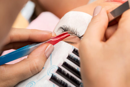 Procedure of eyelashes extension in salon