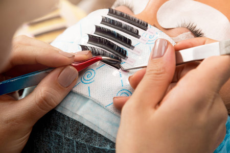 Procedure of eyelashes extension in salon
