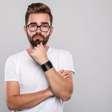 Stylish bearded man in eyeglasses