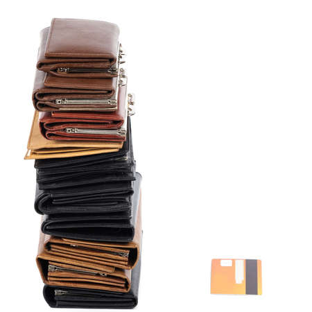 Cash or credit ? A lot of leather wallets and one cardの写真素材