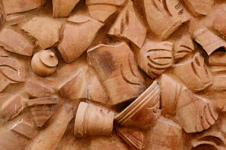 Wall made of an old  different pottery products.の写真素材