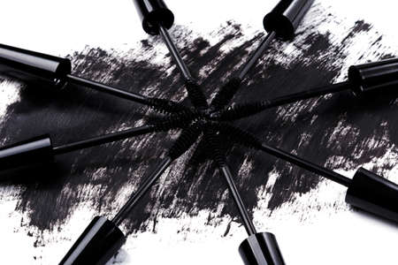 Close up of brushes and smudged mascaraの写真素材