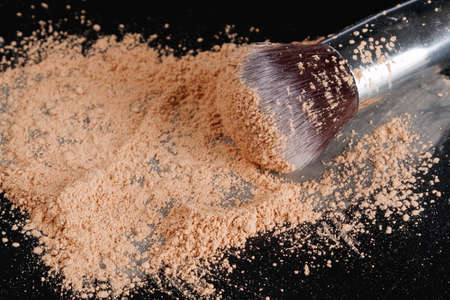 Close up of make-up brush and foundation powderの写真素材