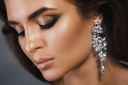 Portrait of gorgeous woman with a beautiful make-upの写真素材