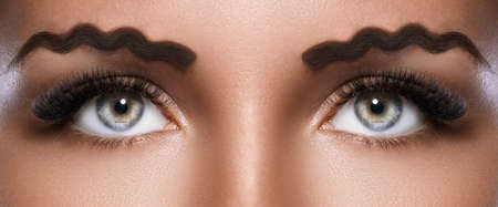 New trend - squiggle or wavy eyebrowsの写真素材